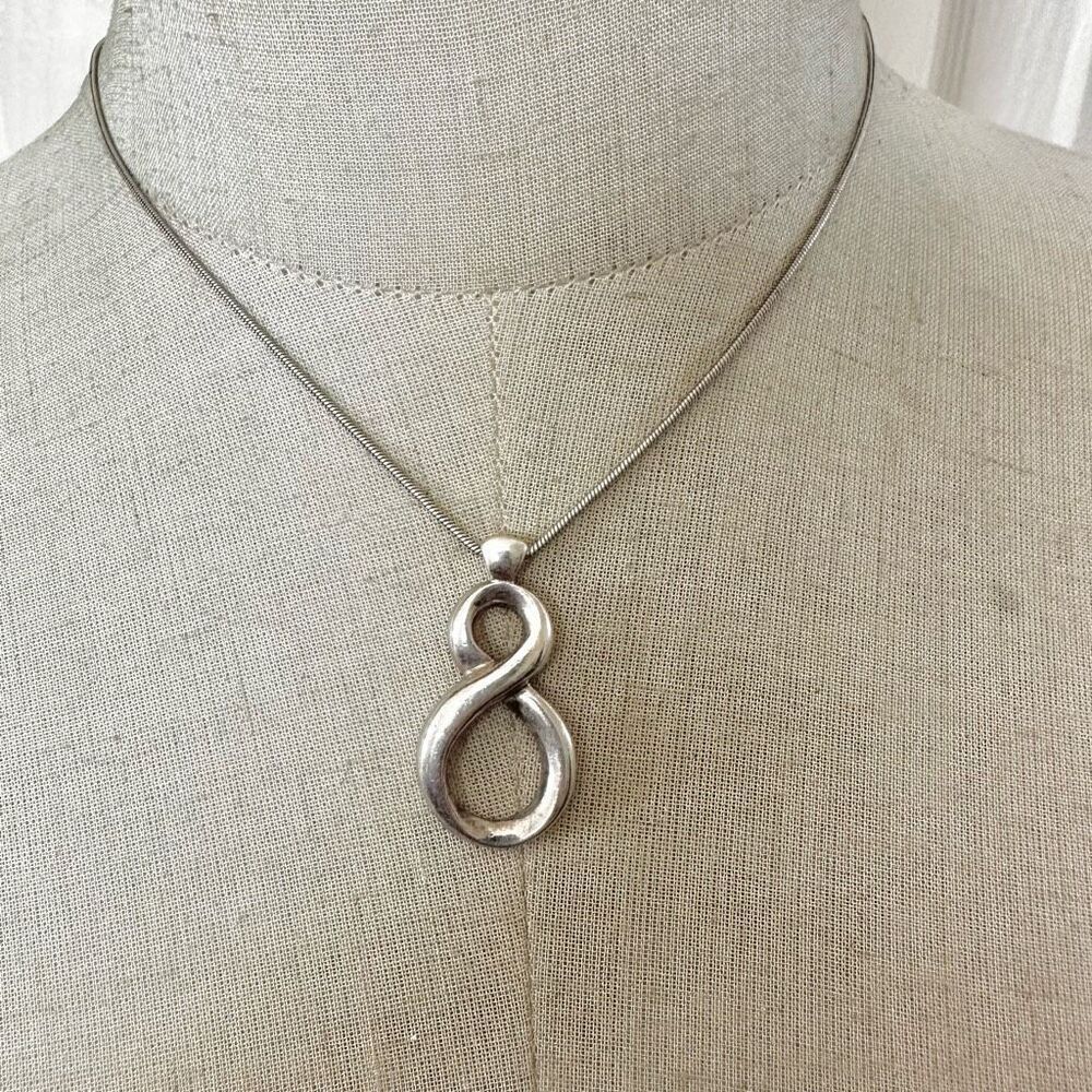 Silver tone pendant necklace